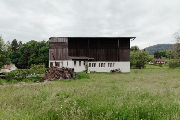 Farm barn in green countryside